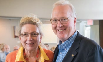 Frieda Bleeck ’66, pictured here with Merrimack President Dr. Christopher E. Hopey, at her 50th class reunion.