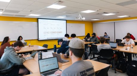 Photo of Merrimack students studying in a classroom.