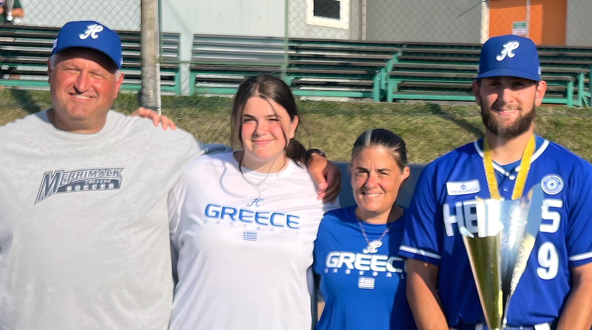 Photo of the Athanasiadis family (Paul, Nadia, Danielle and George) standing next to one another.